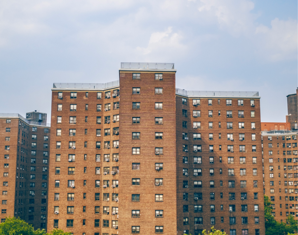 Tall brick buildings with many windows