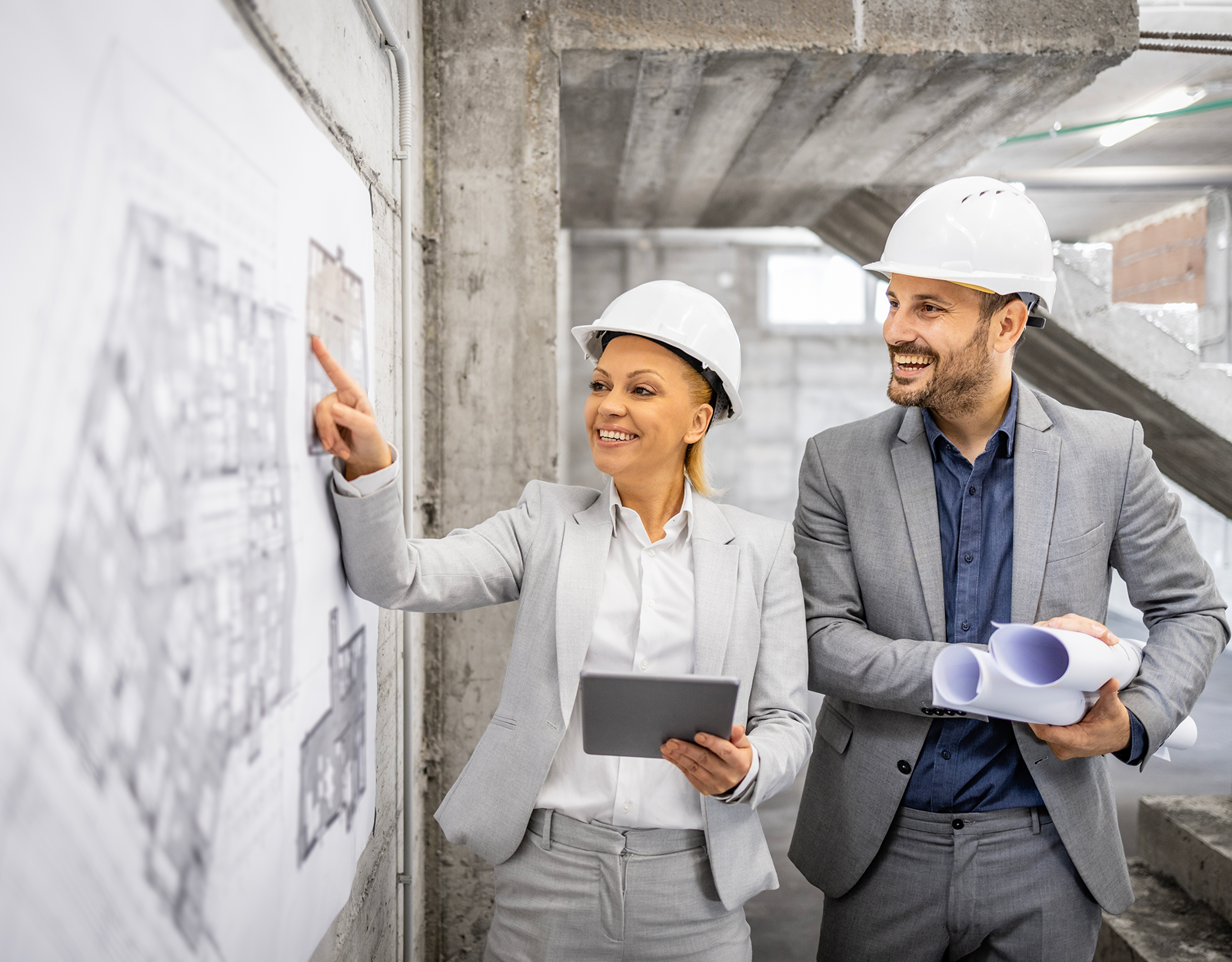Architects discussing building plans