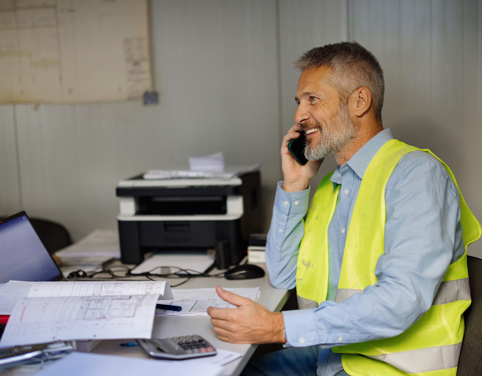 Engineer discussing project over the phone